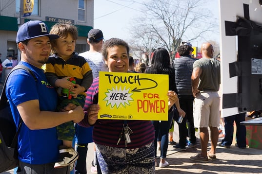 Fans holding signs Boston Marathon